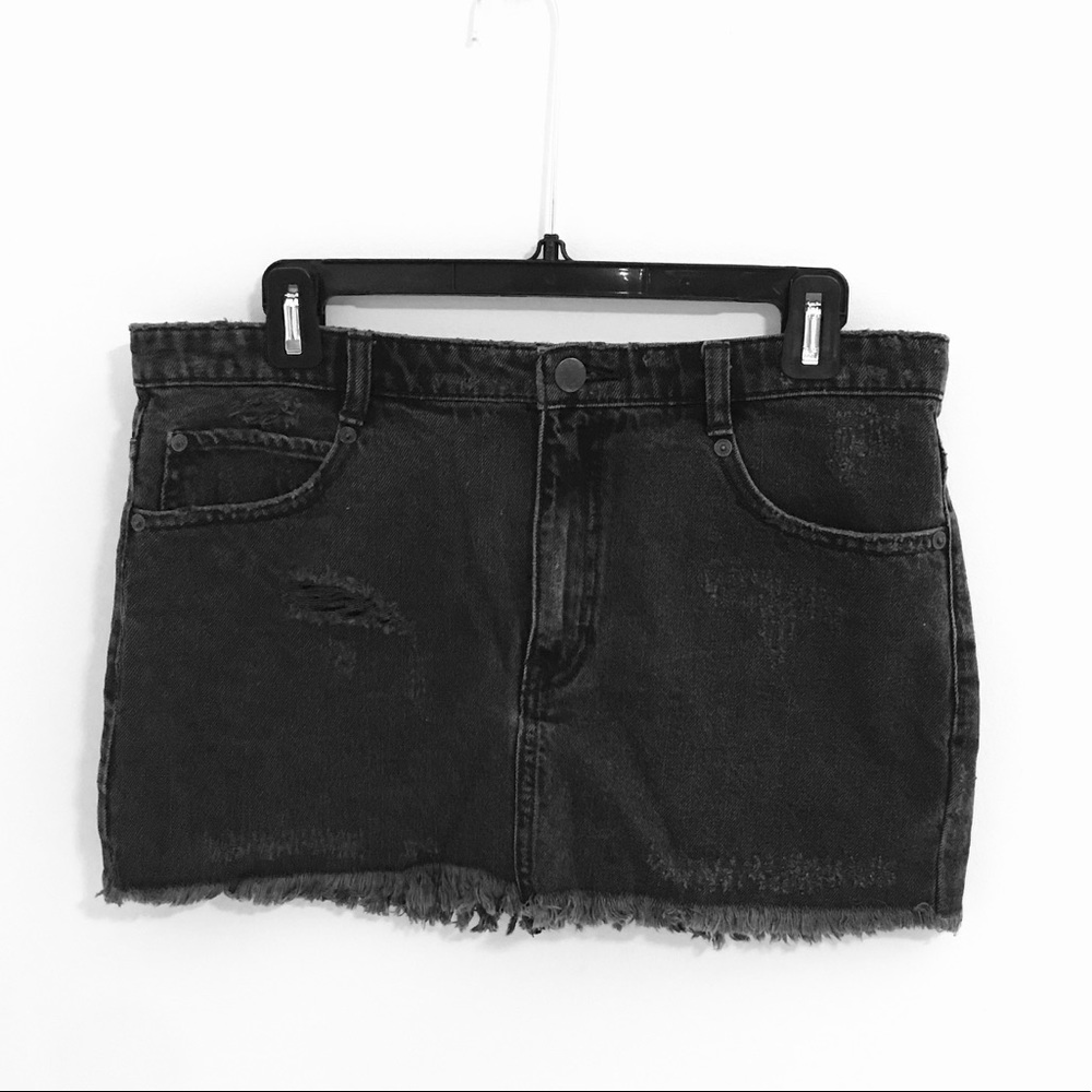 Free people black distressed jean mini skirt